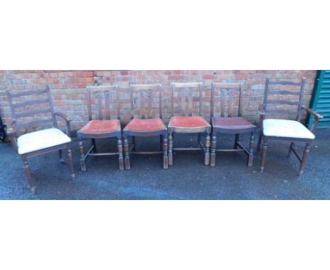 A set of four oak dining chairs, each with a slatted and carved back, with a drop in seat, and two further ladder back chairs
