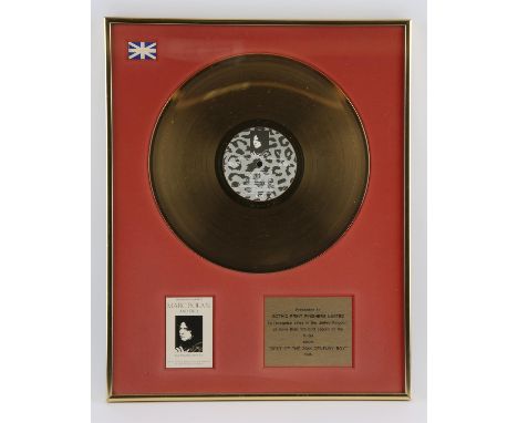 Marc Bolan and T.Rex Gold Disc, presented to Gothic Print Finishers Limited, to recognise sales in the UK of more than 100,00