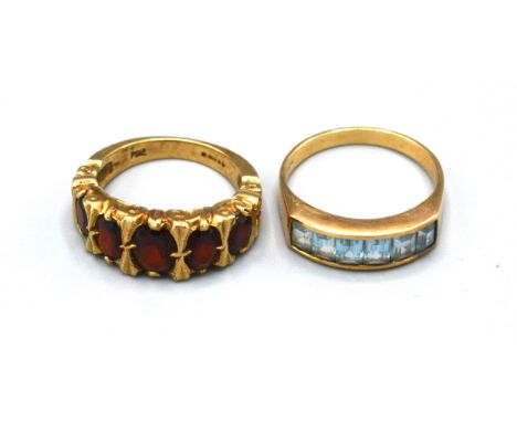 A 9ct. Gold Dress Ring set five graduated garnets, ring size L, 4.9 gms. together with another similar 9ct. gold dress ring s