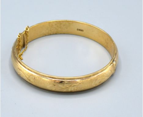 A 9ct. Gold Bangle, 16 gms. 