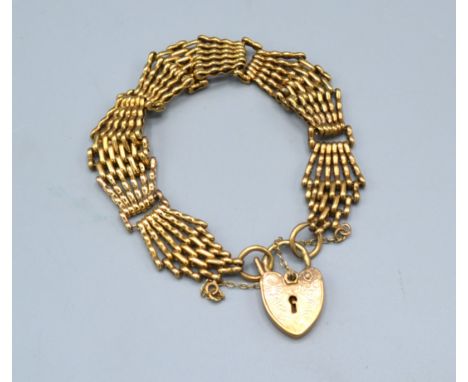 A 9ct. Gold Gate Link Bracelet with Padlock Clasp 25.1 gms. 