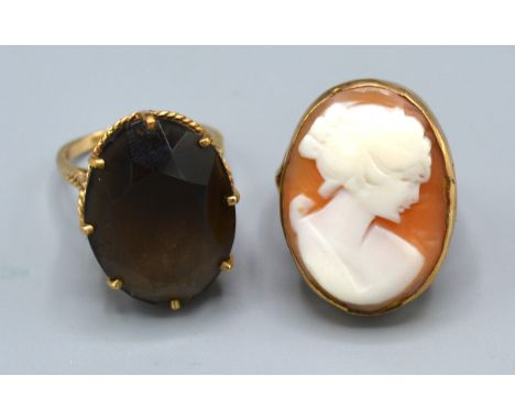 A 9ct. Gold Cameo Set Ring, ring size O, 5.8 gms. together with another 9ct. gold dress ring set large oval stone, ring size 