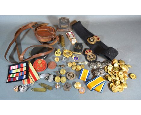 An Early 20th Century Clinometer by Lawrence &amp; Mayo Ltd. London within leather case together with various military badges