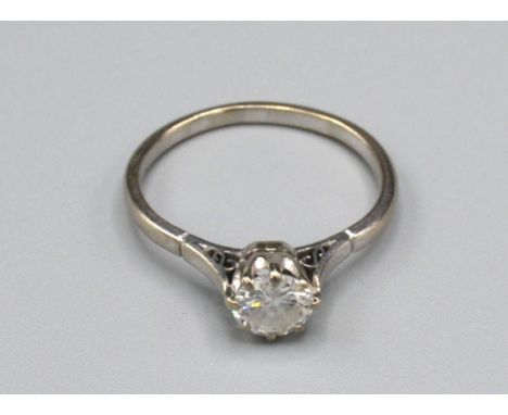 A White Metal Solitaire Diamond Ring approximately 0.50 ct. claw set ring size Q 3.2gms 