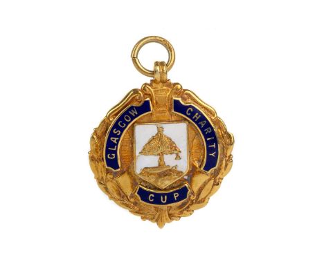 CHIC GEATONS OF CELTIC F.C., GLASGOW CHARITY CUP WINNERS GOLD MEDAL, 1937  the obverse with enamel crest bordered by inscript