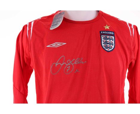 DAVID BECKHAM OF ENGLAND, SIGNED INTERNATIONAL JERSEY, loose, Umbro tag, with COAsize XLB