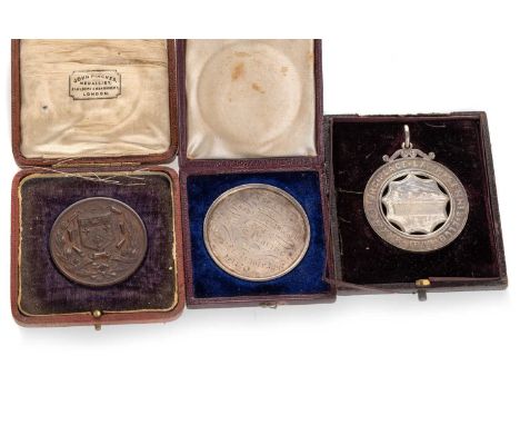 THREE SPORTING MEDALS, LATE 19TH/EARLY 20TH CENTURY comprising Saxe Coburg Place Lawn Tennis Club white metal medal 1890, wit