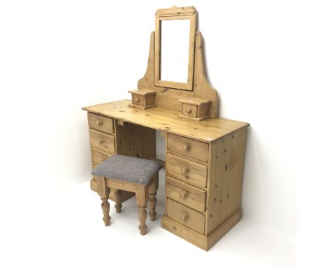 Pine twin pedestal dressing table, eight drawers, plinth base (W130cm, H80cm, D51cm) a dressing mirror with two trinket drawe