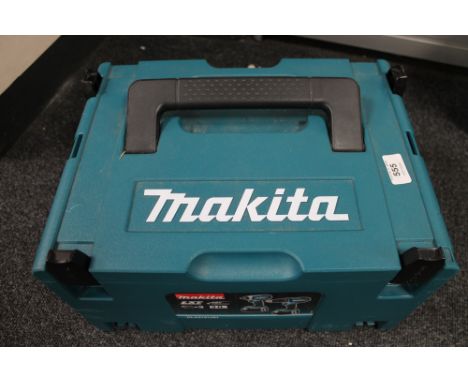 A Makita 18v cordless hammer drill with two batteries in box  CONDITION REPORT: Charger is present. 