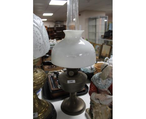 A vintage brass oil lamp 