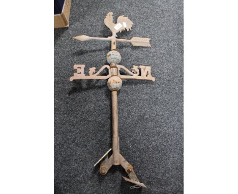 A metal cockerel weather vane