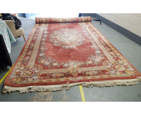 A very large Chinese carpet, approximately 7m x 2.5m