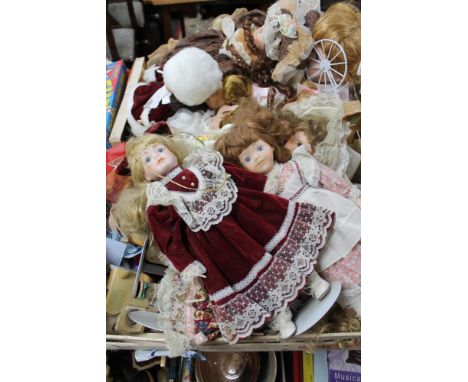 Two crates of ceramic and other twentieth century dolls 