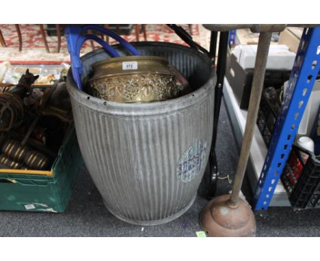 An antique tin wash tub together with poss stick, iron shoe last etc 