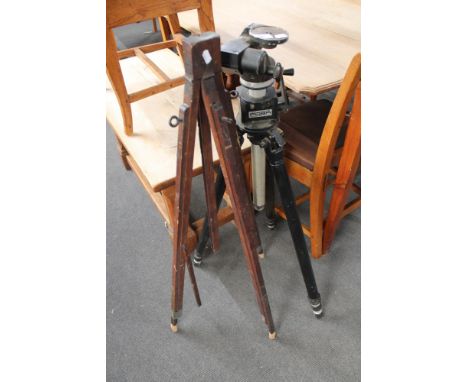 Two vintage camera tripods. 