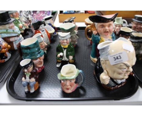 A tray of fourteen ceramic character jugs (14)