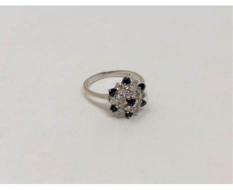 An 18ct gold sapphire and diamond ring, size K CONDITION REPORT: 3.2g. 