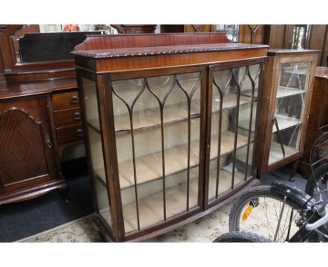 An Edwardian mahogany bow fronted display cabinet 