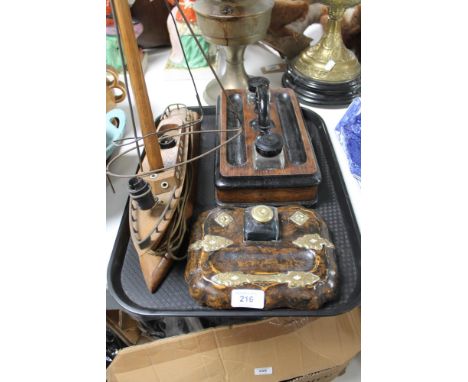 A Victorian walnut ink stand and one other, a ship table lamp  