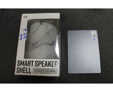 Apple : A Track Pad, without box or cables, together with a Kit Smart Speaker Shell (Replacement shell for Amazon Echo Smart 
