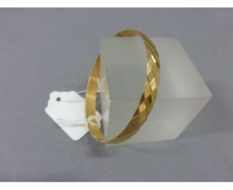 Yellow Metal Cross Cut Bangle stamped 875