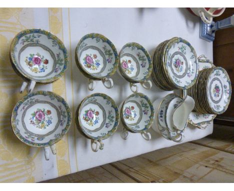 Aynsley Floral Patterned Tea Service comprising Twelve Cups, Eleven Saucers, Twelve Plates, Two Sandwich Plates, Milk and Sug