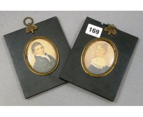 Pair of 19th century Miniature Portrait of a Gentleman and a Lady in an Ebonised Frames