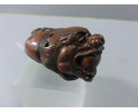 Signed Wood Netsuke of a Two headed Dragon