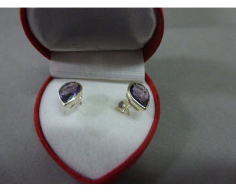 Pair of Silver and Amethyst Teardrop Shaped Earrings