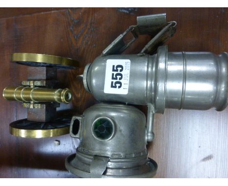 Vintage Lucas Bicycle Lamp and a Model Canon
