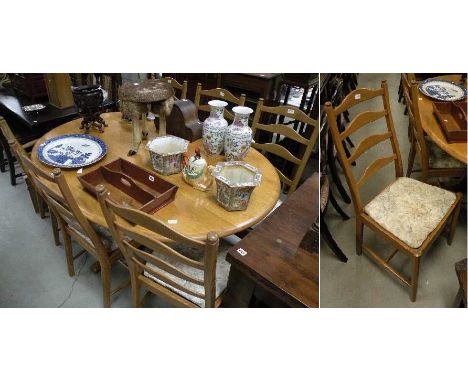 Ercol Pale Elm Top Oval Dining Table together with Six Ercol Dining Chairs