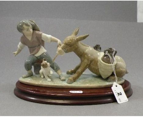 Lladro Figure of a Boy with Dog pulling a Donkey