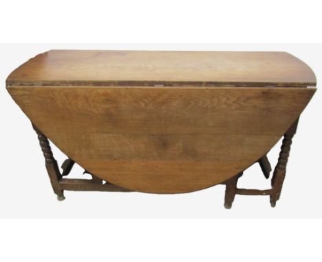 Georgian oak gate leg table with bobbin turned legs&nbsp; 171cm by 143cm Ht 75cm