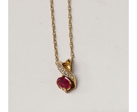 9k / 375 ruby and diamond chip pendant on fine 9ct gold chain, 1.41g total weight