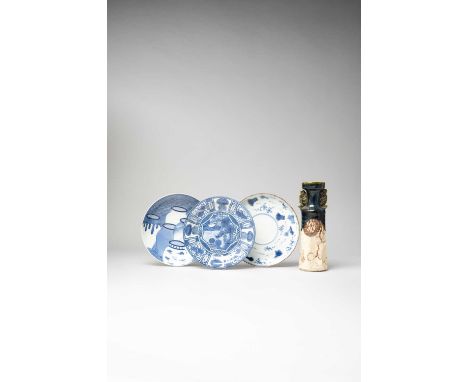 THREE JAPANESE BLUE AND WHITE DISHESEDO AND LATER, 17TH CENTURY AND LATEROne dish in Kraak style with a central panel enclosi