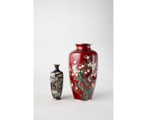 TWO JAPANESE CLOISONNE ENAMEL VASESMEIJI OR LATER, 19TH/20TH CENTURYThe large ginbari vase of baluster shape, decorated with 