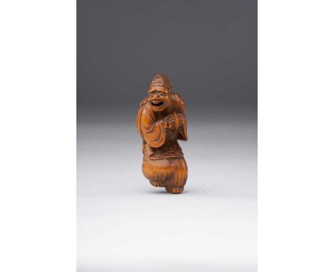 A JAPANESE WOOD NETSUKE OF A STREET PERFORMERMEIJI ERA, 19TH CENTURYThe entertainer is depicted holding cymbals and cheerfull