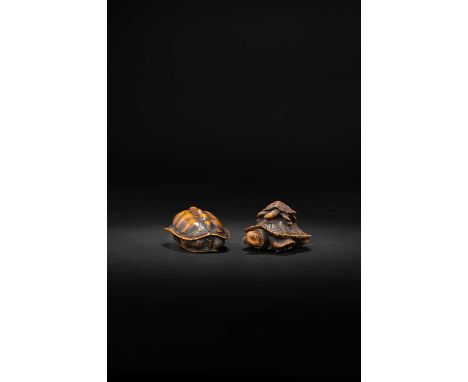 λ TWO JAPANESE WOOD NETSUKE OF TURTLES MEIJI ERA, 19TH CENTURY  The first depicting a large tortoise carrying its young on it