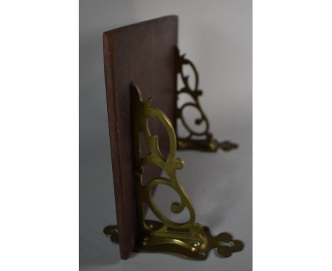 A Pierced Brass Shelf Bracket with Wooden Top, 28.5cm Wide 