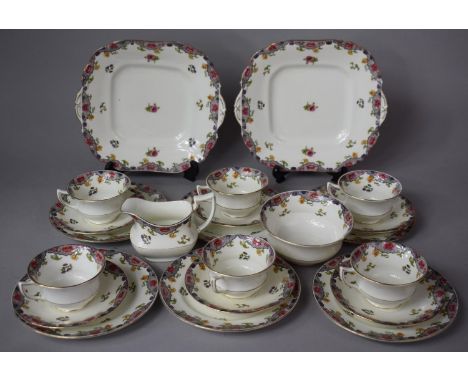 An Aynsley Floral Pattern Tea Set to comprise Six Cups, Six Saucers, Six Side Plates, Two Cake Plates, Milk Sugar 