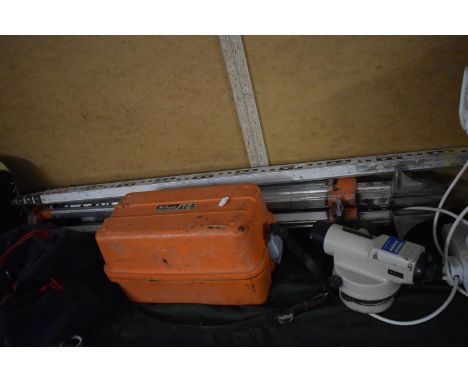 A Nikon Automatic Dumpy Level with Tripod and Staff 