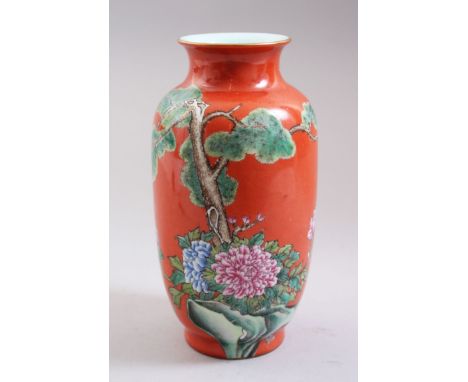 A GOOD 20TH CENTURY CHINESE REPUBLICAN RED GROUND PORCELAIN LANTERN VASE, decorated upon a red ground with scenes of flora an