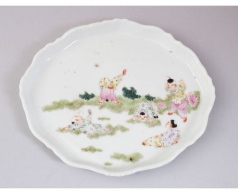 A 19TH CENTURY CHINESE FAMILLE ROSE PORCELAIN TRAY, painted decoration with scenes of boys playing in a garden setting, 17cm 