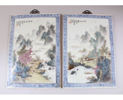 A PAIR OF REPUBLICAN FAMILLE ROSE ENAMEL PORCELAIN TILE / PLAQUES, decorated with a greek key border encapsulating tranquil l