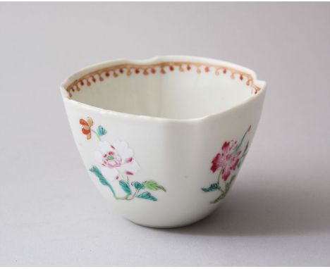 AN 18TH CENTURY CHINESE FAMILLE ROSE PORCELAIN TEA CUP, with inverted rim corners, and finely painted enamel scenes of floral