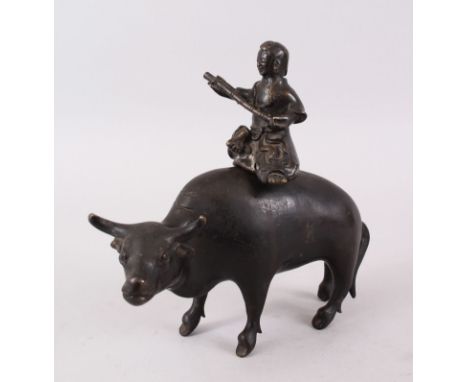 A 19TH / 20TH CENTURY CHINESE BRONZE / CENSOR OF A BOY RIDING A BUFFALO, the boy playing a musical instrument, the boy itself