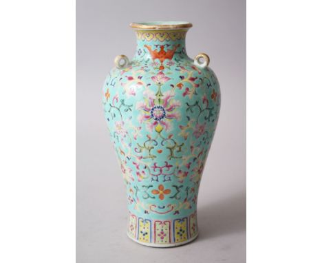 A GOOD 19TH CENTURY CHINESE TURQUOISE GROUND FAMILLE ROSE ENAMEL VASE, with a lappet border to the lower section, the body wi