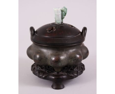 A CHINESE BRONZE &amp; JADE INCENCE BURNER / CENSOR WITH HARDWOOD STAND,  the bronze censor stood on three feet, the side mou