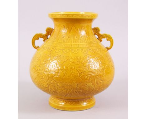 A CHINESE QIANLONG STYLE YELLOW GLAZED PORCELAIN JAR, the body decorated with flora and formal scroll, petal lappet style bor