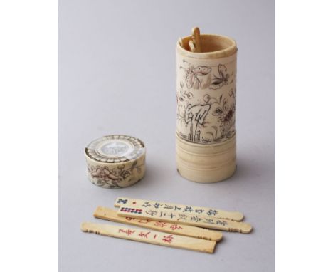 A CHINESE 19TH CENTURY CYLINDRICAL LIDDED BOX WITH STICK COUNTERS, the body of the pot incised with floral decoration with bu